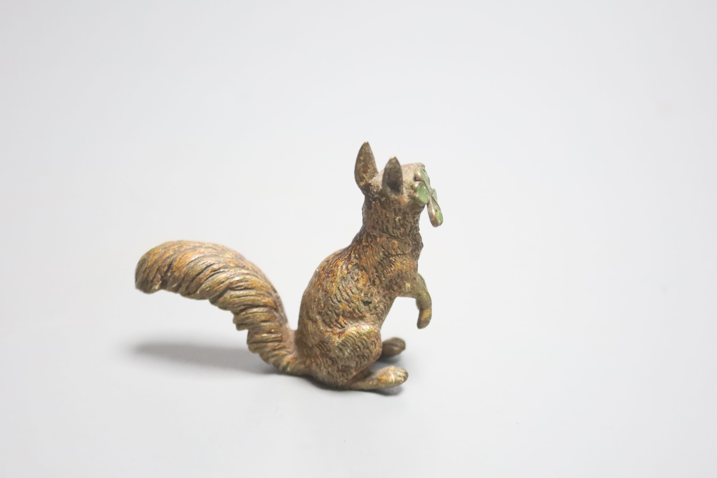 An Austrian cold painted bronze squirrel holding a clover, height 5cm